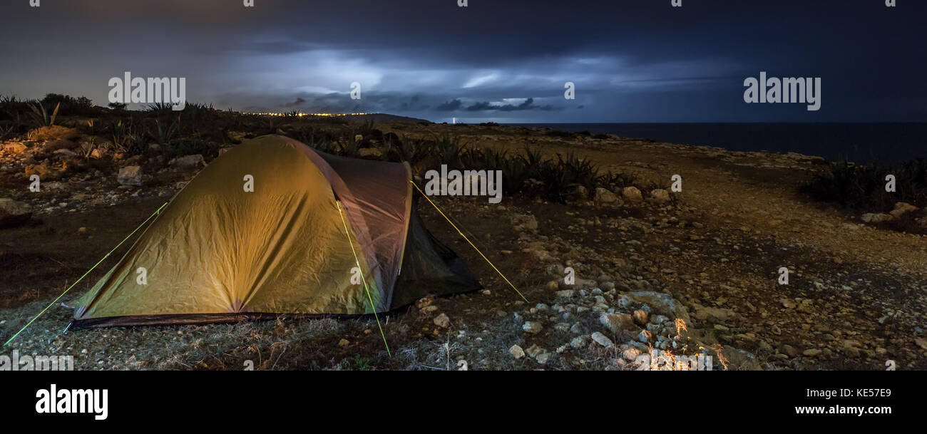 A Camping Tent Set Up During A Thunderstorm Stock Photo Alamy