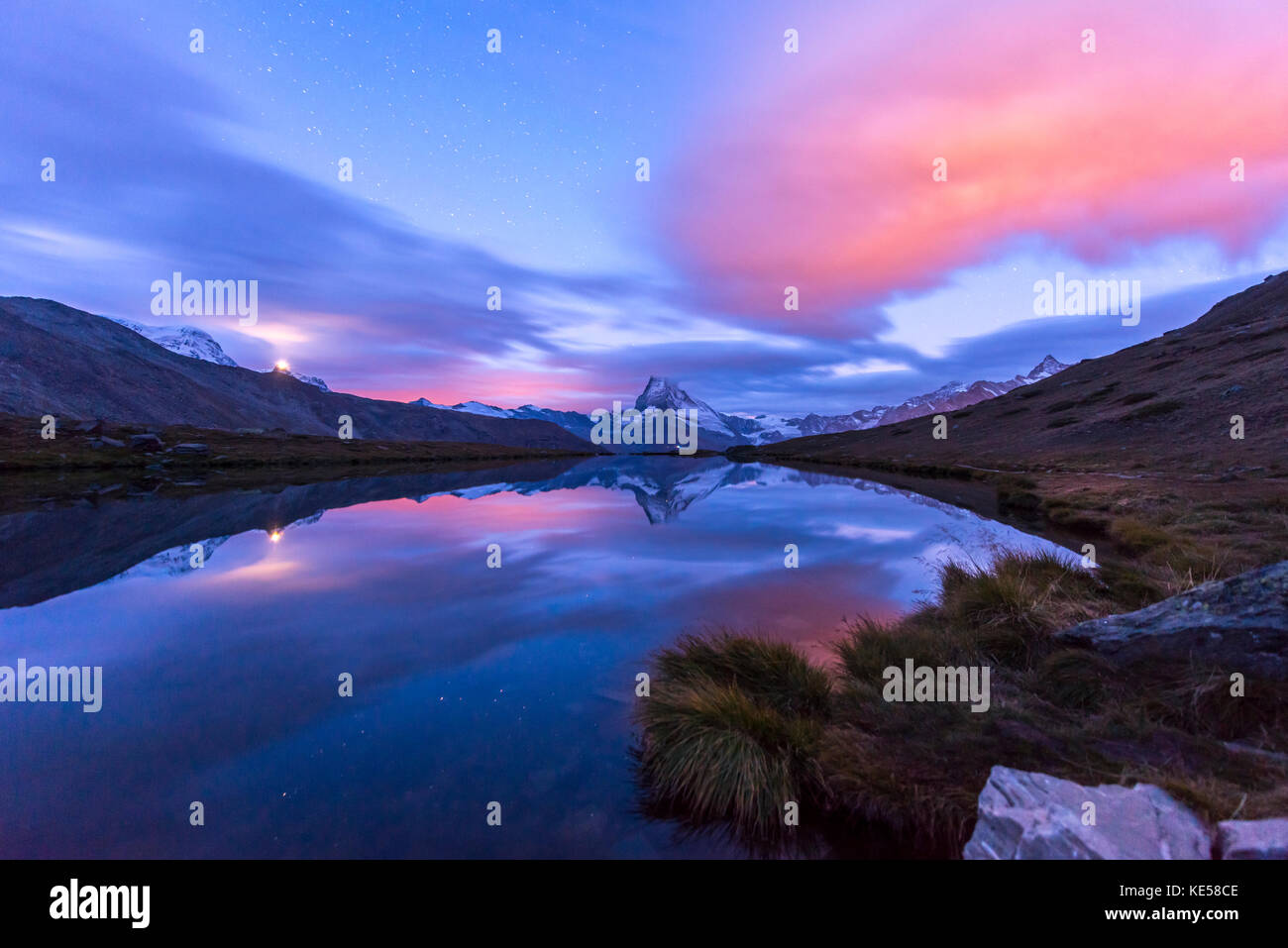 Matterhorn is reflected in the Stellisee at dawn, Zermatt, Valais Alps, Canton Valais, Switzerland Stock Photo