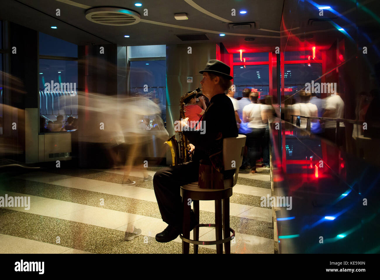 New York City, Usa - July 11, 2015: Wil Greenstreet performing with saxophone. His current gig is entertaining visitors to the 86th floor of the Empir Stock Photo