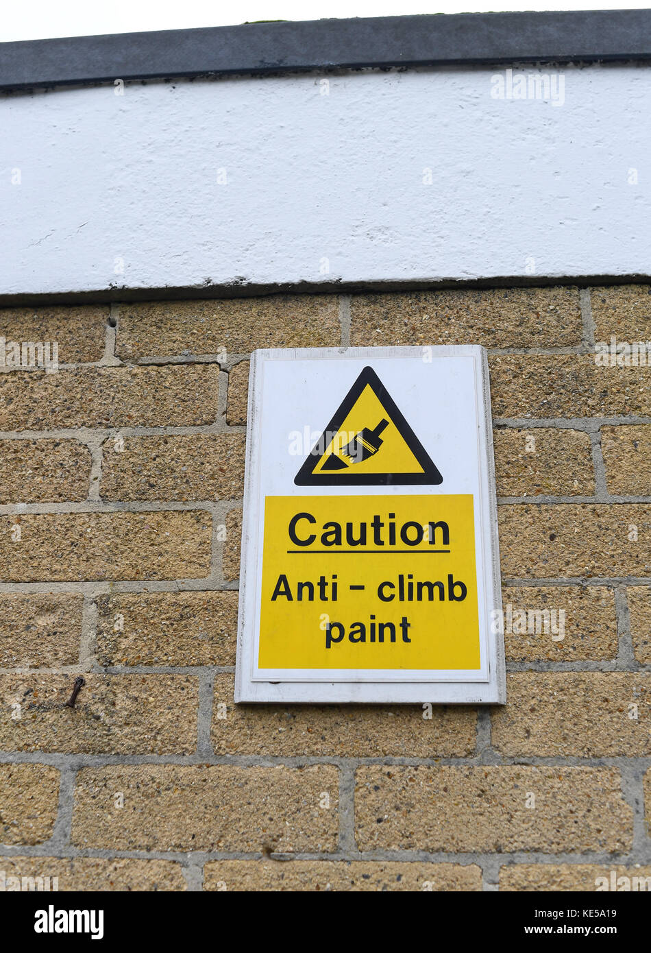 Anti climb paint warning sign Stock Photo Alamy