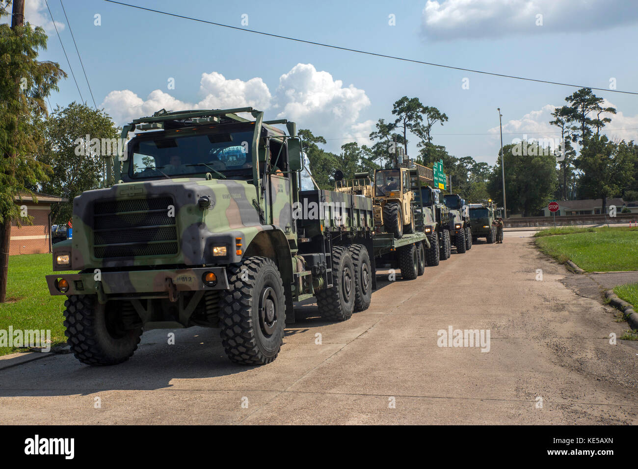 Marine Corps Medium Tactical Vehicle Replacement 7-ton trucks transport supplies to Texas. Stock Photo