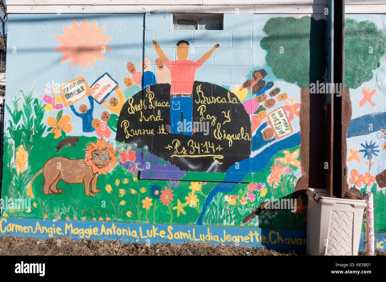 Wall painting on wall of Grupo de Jovenes promoting race relations. Minneapolis Minnesota MN USA Stock Photo