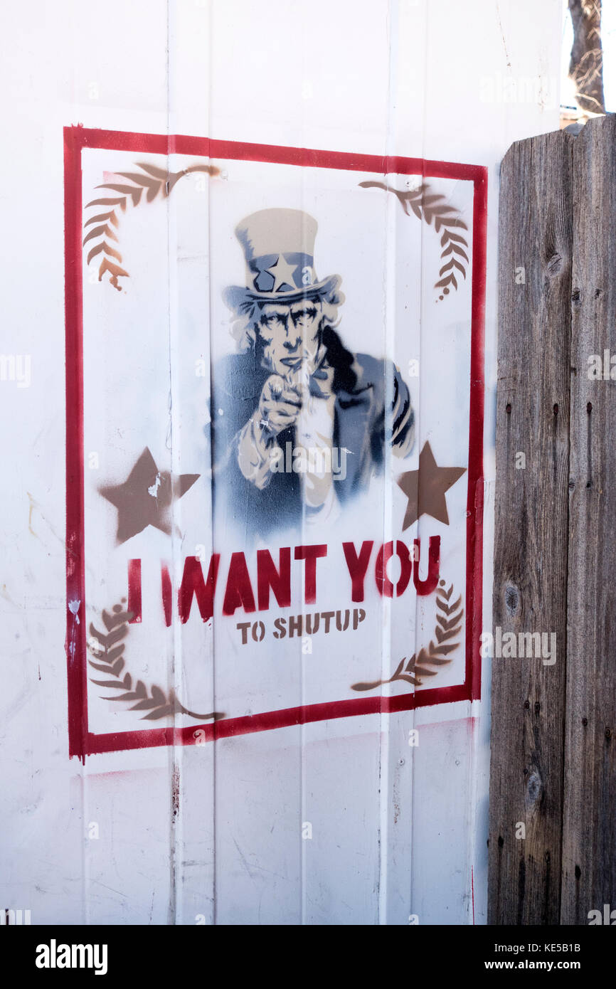 Uncle Sam saying: 'I want you to shutup' poster painted on the Grupo de Jovenes building. Minneapolis Minnesota MN USA Stock Photo