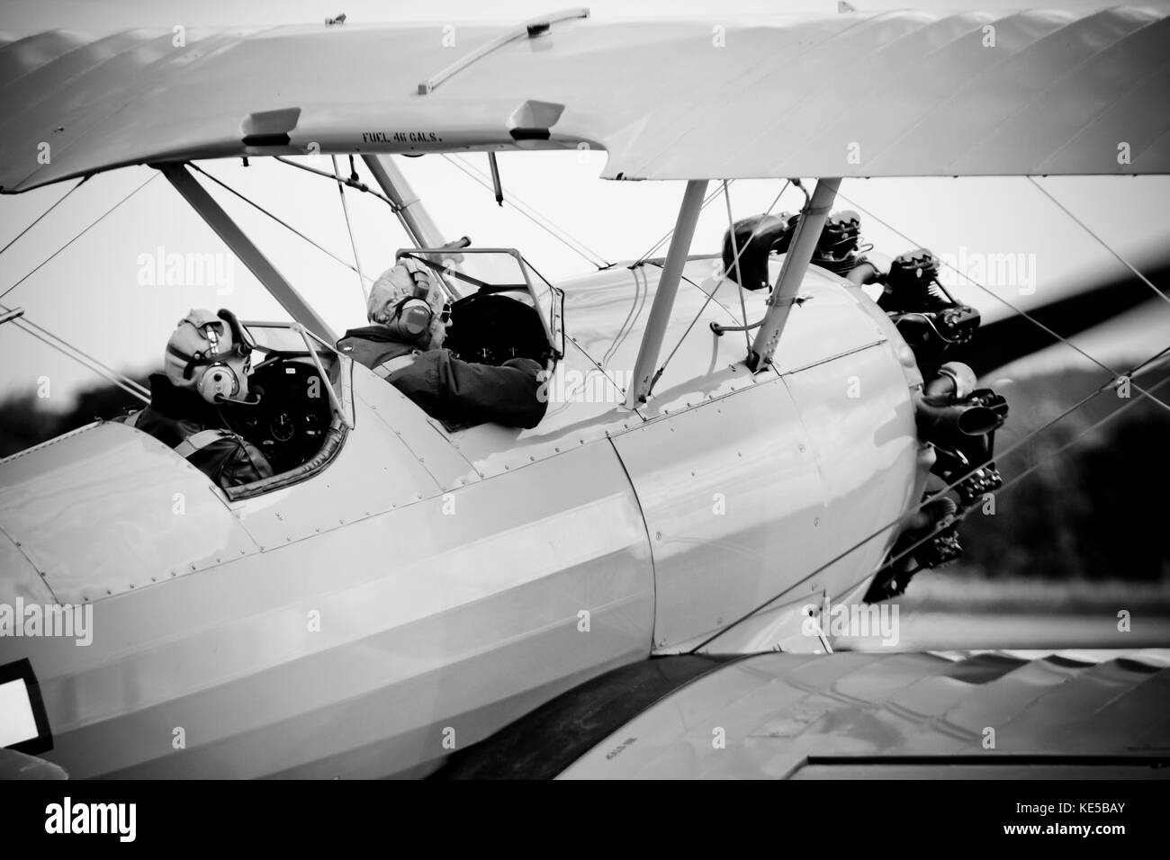 Pilots of a Boeing PT-17 Stearman replica biplane. Stock Photo