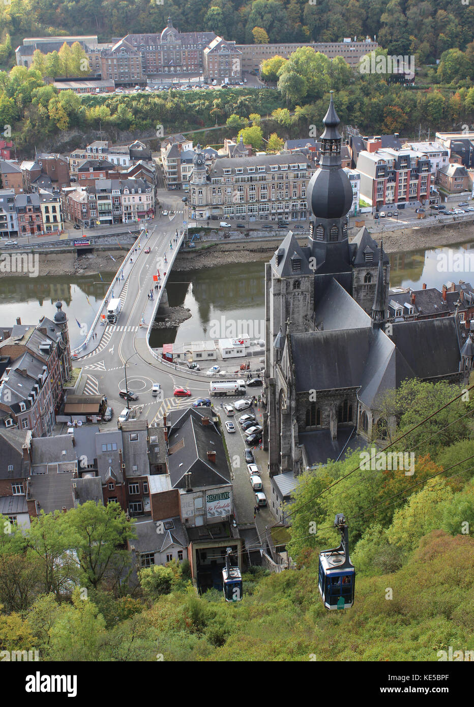 DINANT, BELGIUM, OCTOBER 13 2017: View from the citadel down to the Meuse River and Our Lady's Church in Dinant, Namur. Stock Photo
