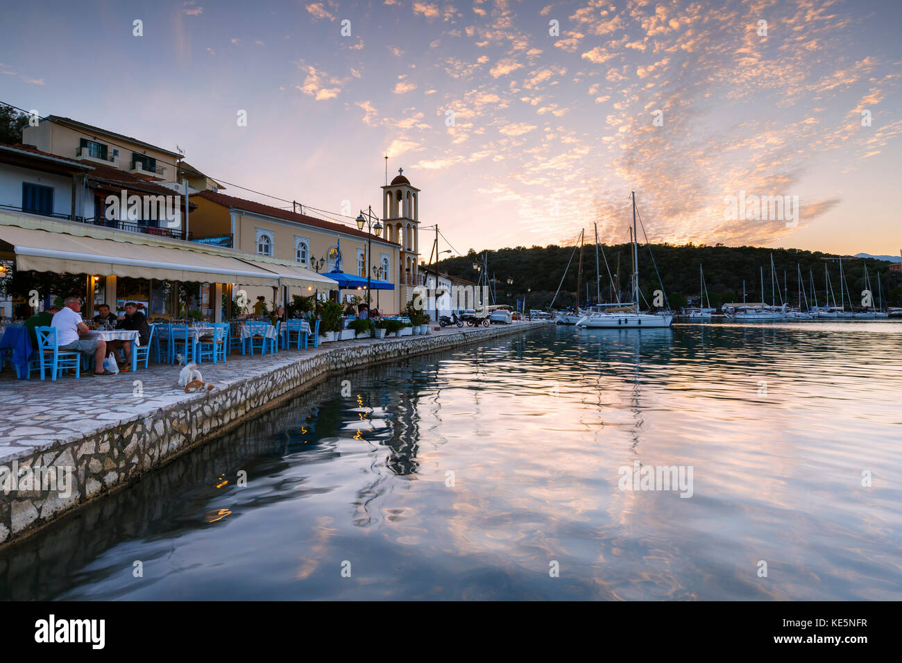 Evening view of the church in Vathy harbur on Meganisi island, Greece ...