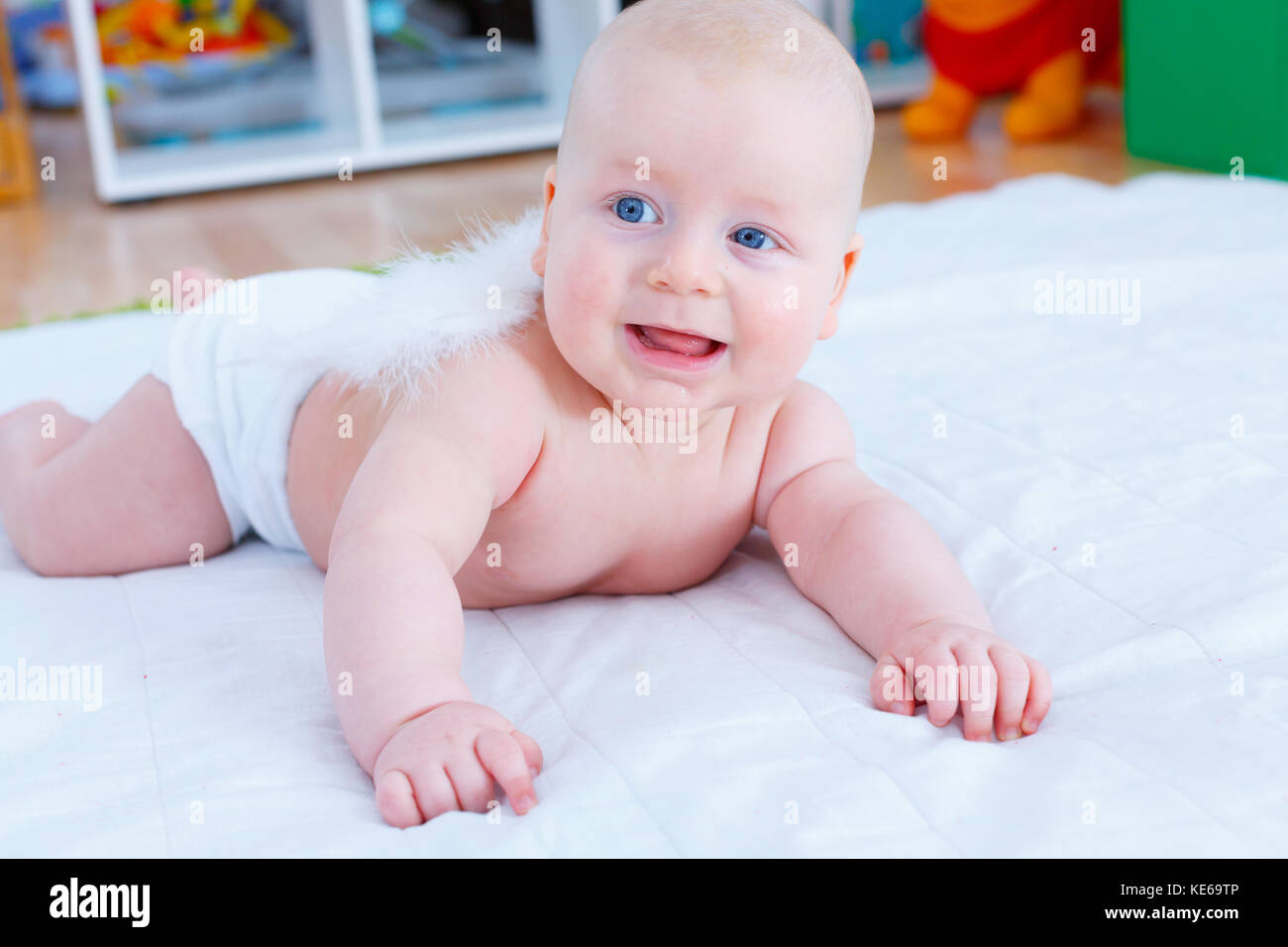 Baby in the nursery Stock Photo - Alamy