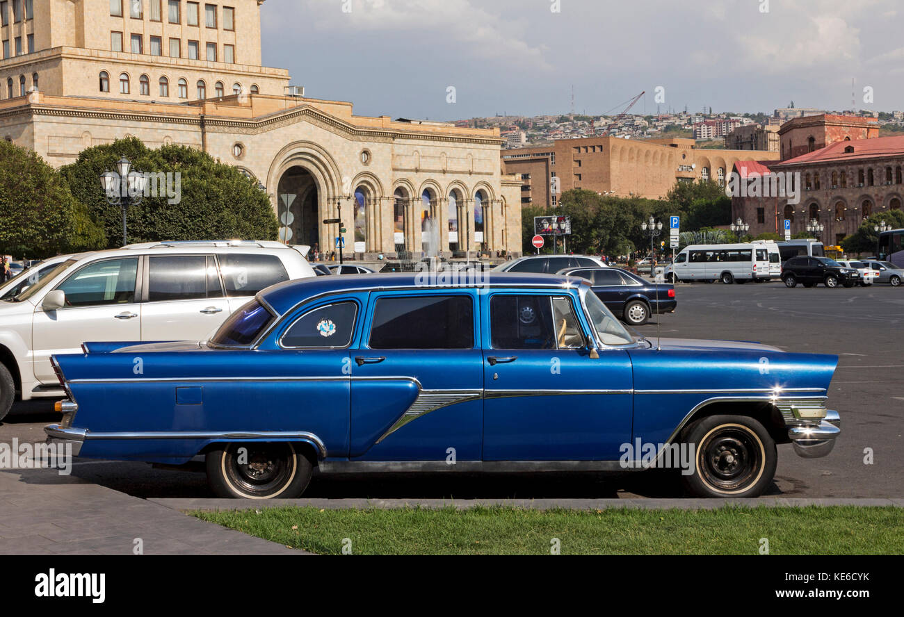 YEREVAN, ARMENIA - SEPTEMBER 17,2017 :Vintage soviet blue car Chaika in the historic center of the city. Stock Photo