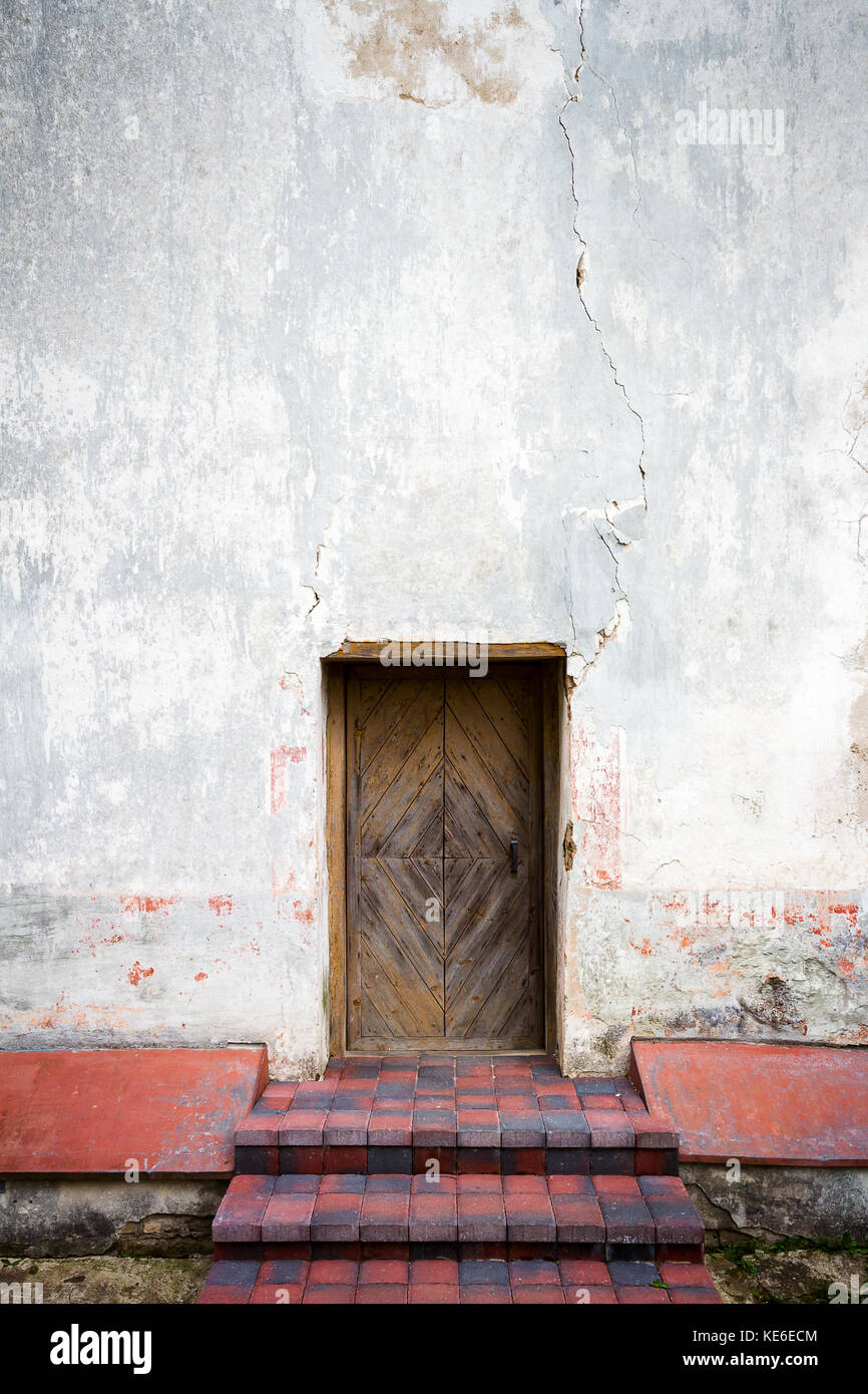 Old wooden door and stone steps Stock Photo - Alamy
