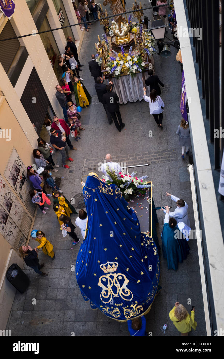 The statues and thrones of Jesus and Mary being taken away after Easter