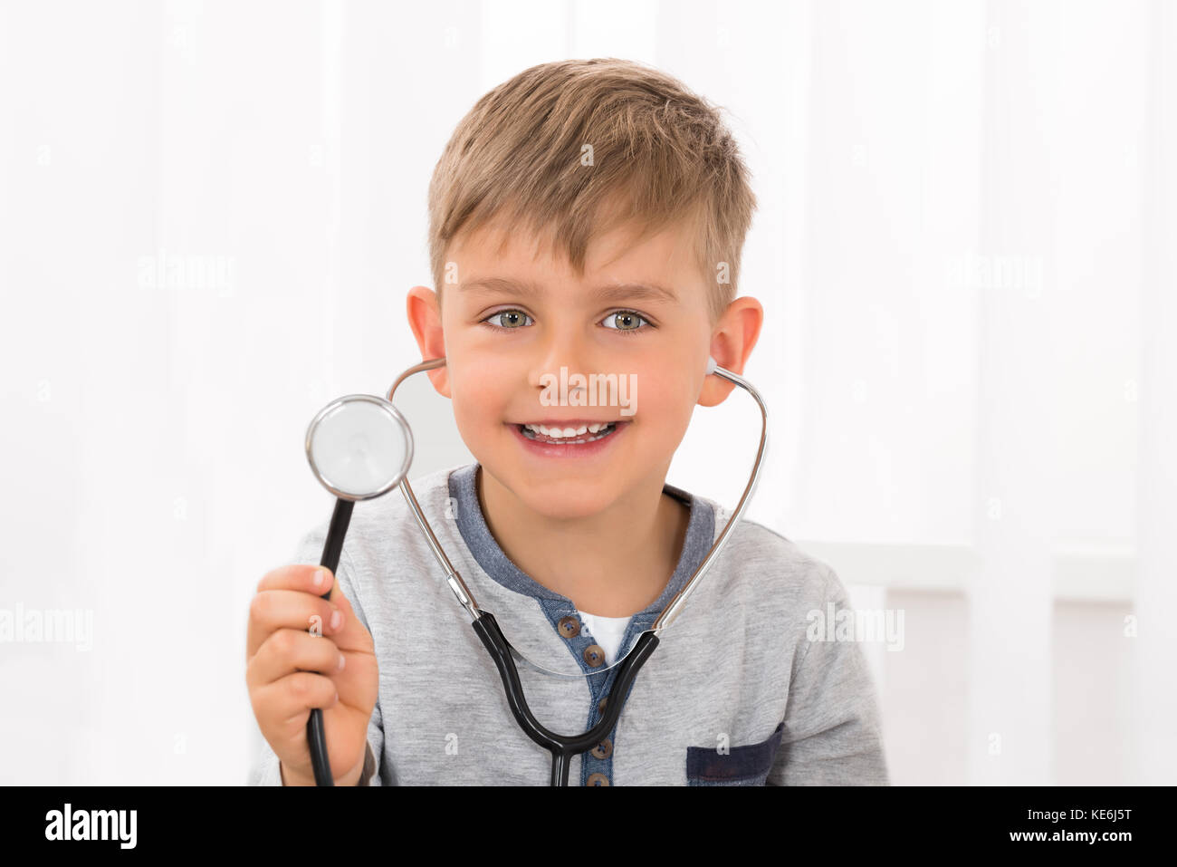 Portrait Of A Happy Boy With Stethoscope Stock Photo