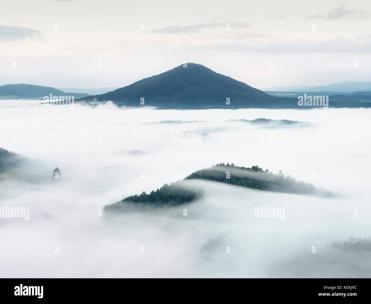 Heavy Mist Heavy mist in landscape. Magnificent autumn creamy fog in countryside ...
