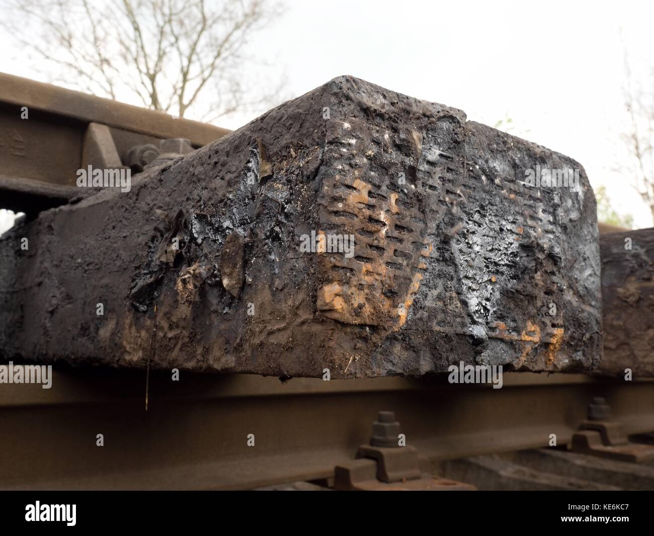 Terrible smell extracted old wooden ties with phenol asphalt paint. Old oiled used oak railway