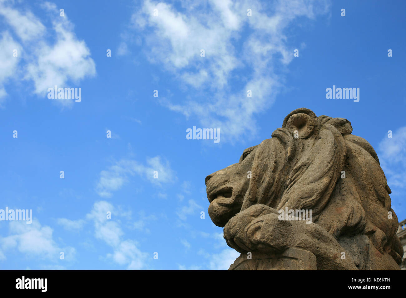 Stone lion head statue in Vienna against blue sky Stock Photo Alamy