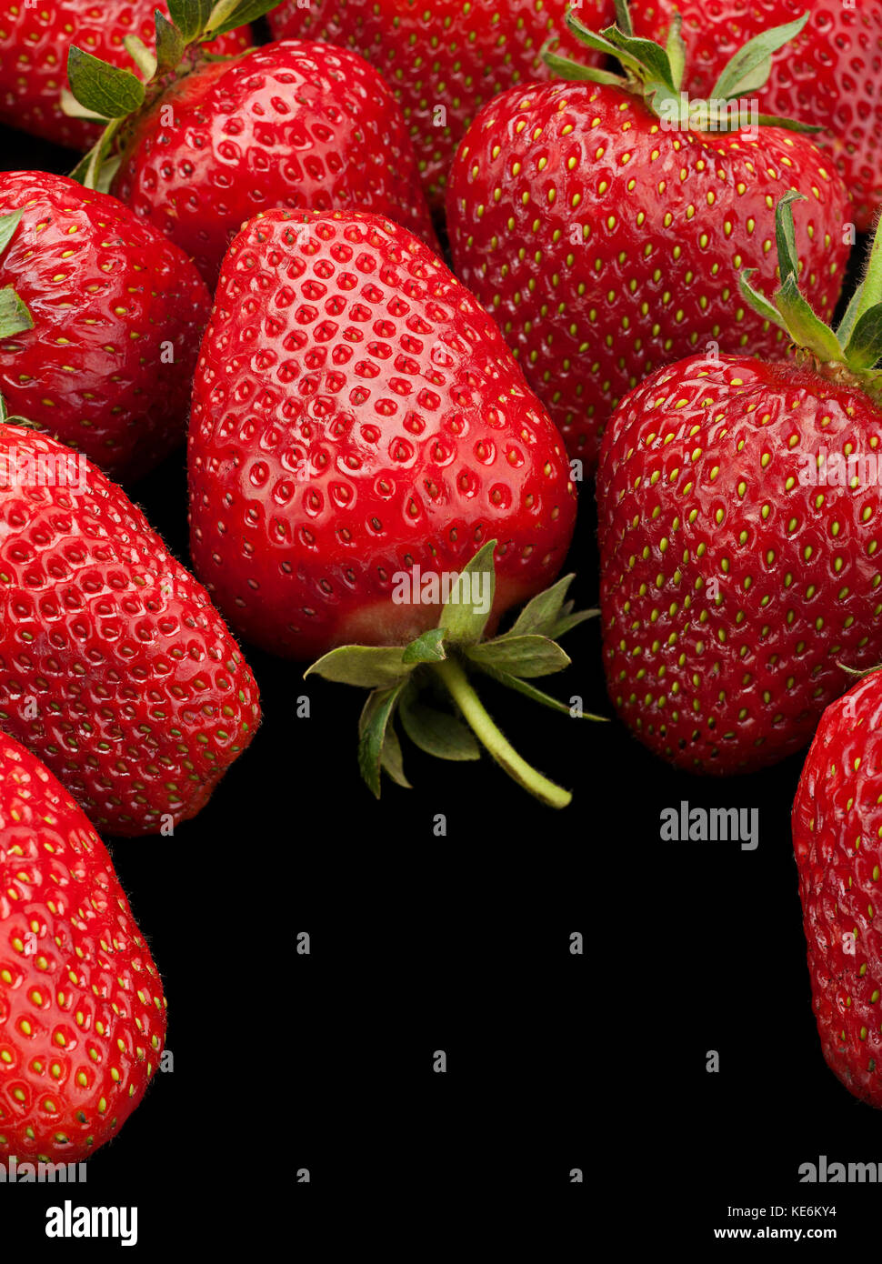 Ripe strawberry fruit berry closeup background Stock Photo - Alamy
