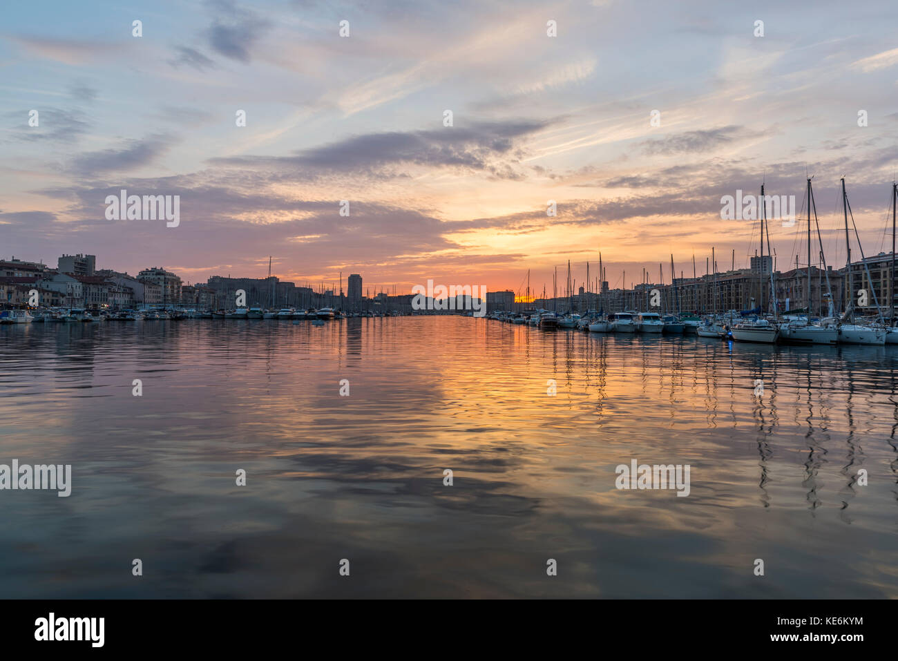 MARSEILLE, FRANCE - OCTOBER 02, 2017: Sunset in old port, the natural harbour of the city and the main popular place in Marseille Stock Photo
