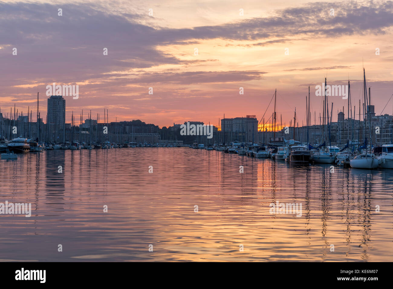 MARSEILLE, FRANCE - OCTOBER 02, 2017: Sunset in old port, the natural harbour of the city and the main popular place in Marseille Stock Photo