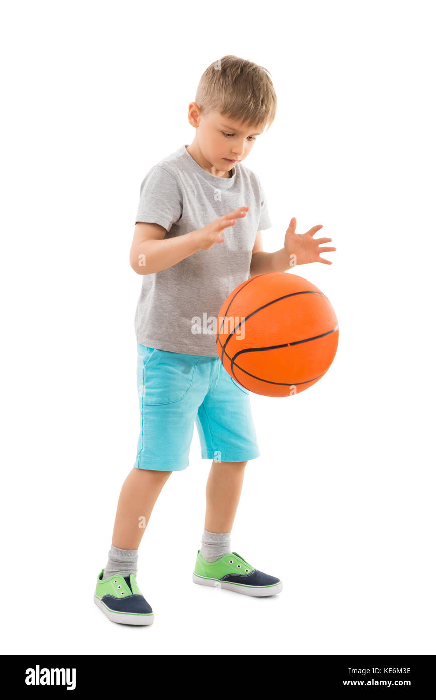 Cute Boy Playing Basketball Over White Background Stock Photo Alamy