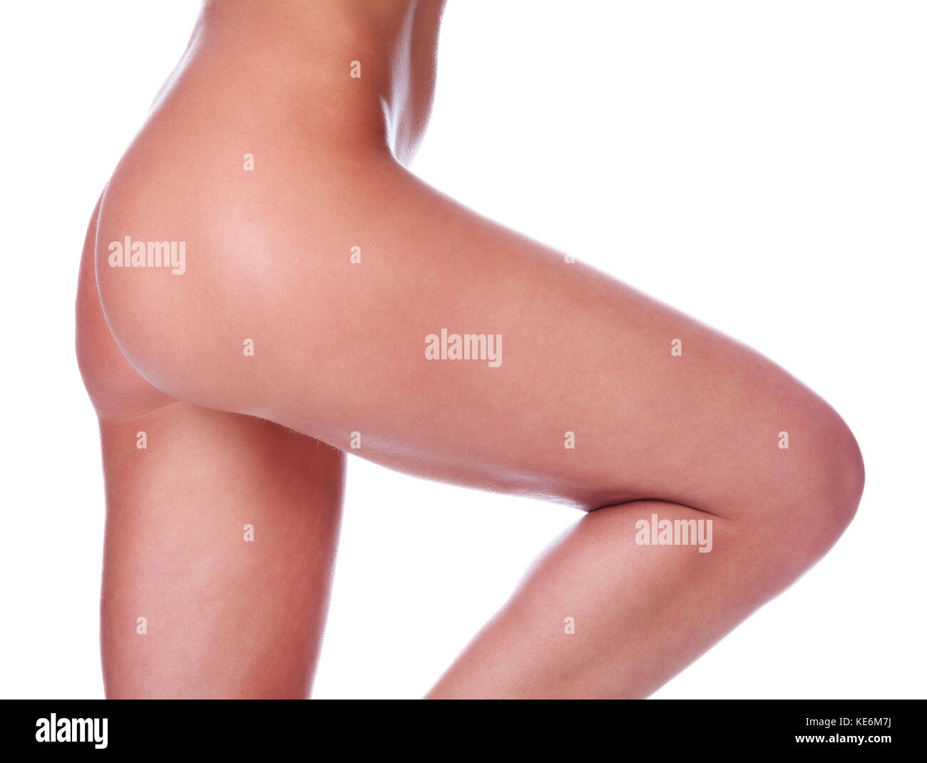 Naked female body with clean and smooth skin, isolated on white background Stock Photo