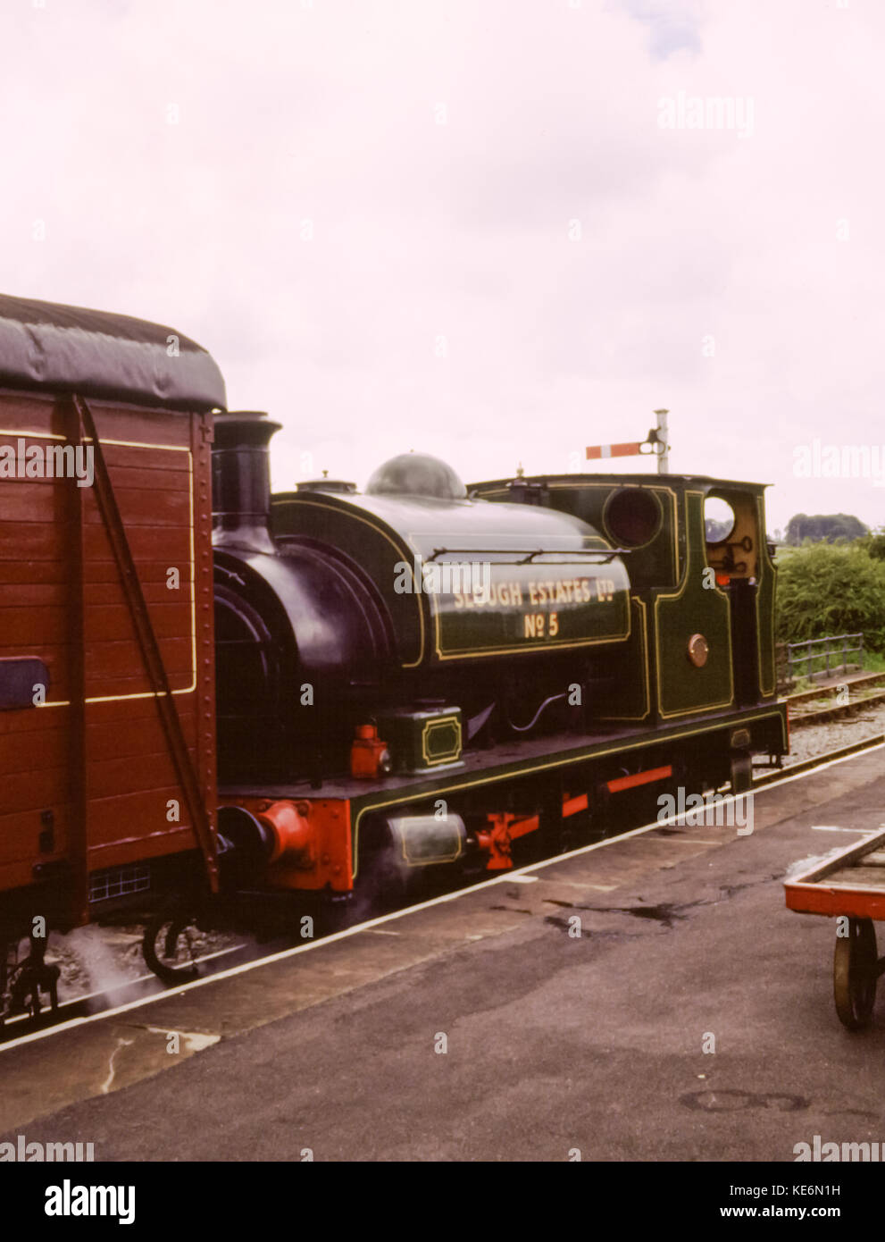 Steam locomotive train at station platform. Steam train is called Slough Estates no 5, Embsay and Bolton Abbey Steam Railway, Yorkshire, England, UK in the 1980s Stock Photo