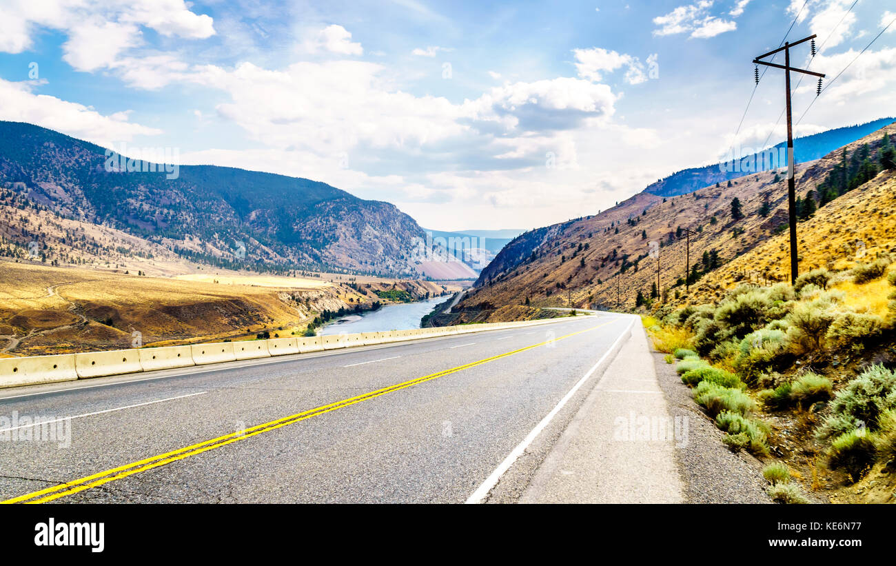 Trans Canada Highway winding through the mountains and along the Thompson River between Cache