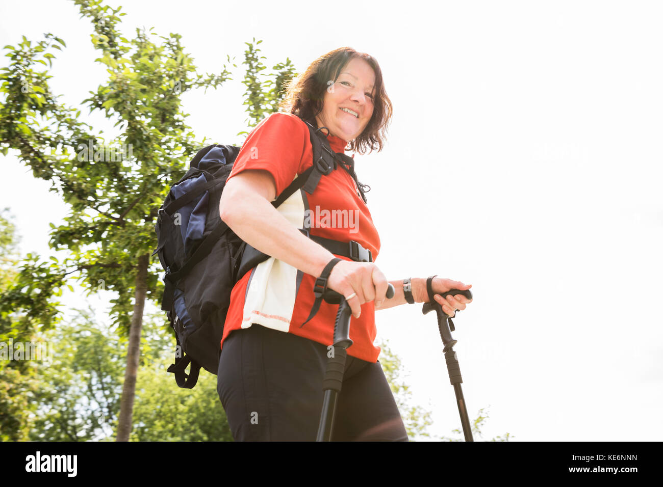 Female hiker backpack poles hi-res stock photography and images - Alamy