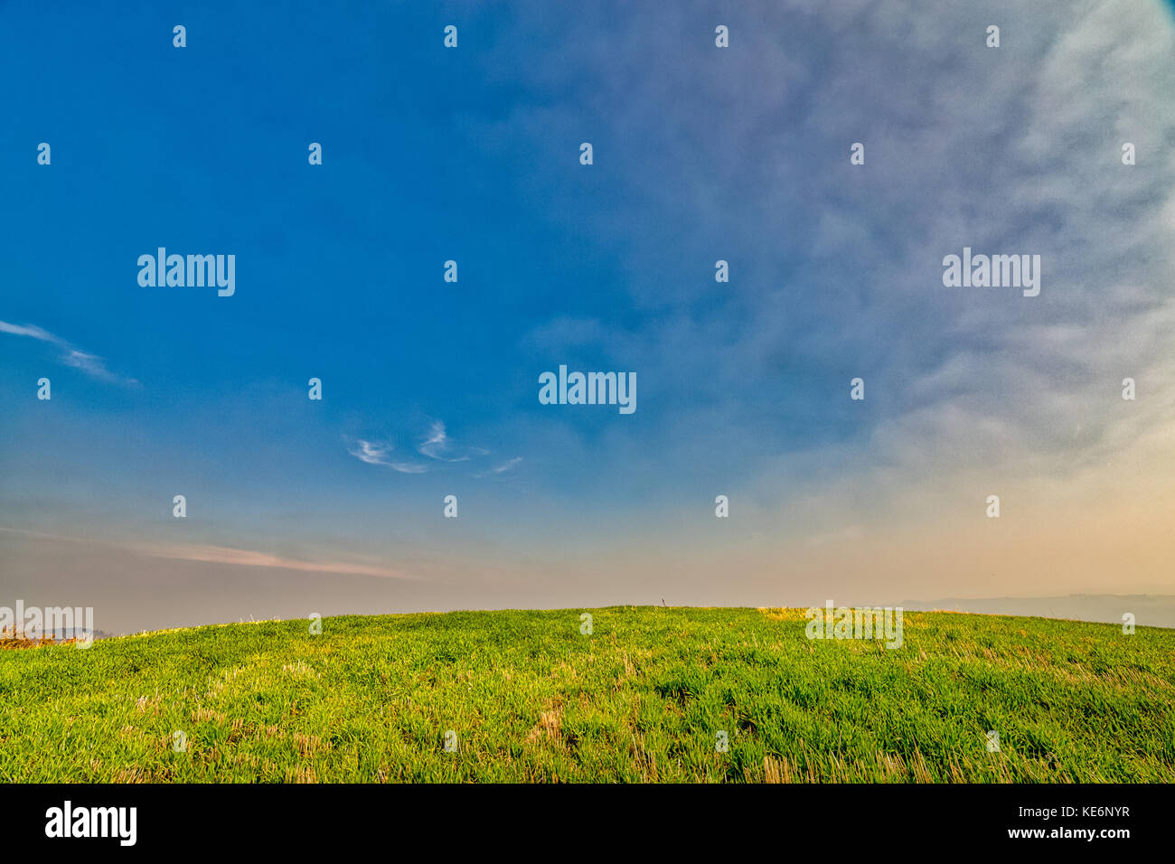 view of green hill in autumn sunny day Stock Photo - Alamy