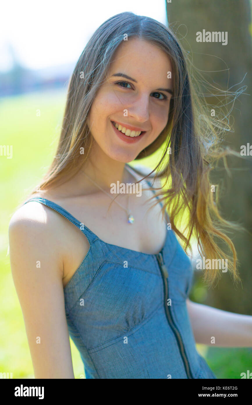 Head Outdoor Portrait Of A Brunette Slim Girl With Long Hair In The