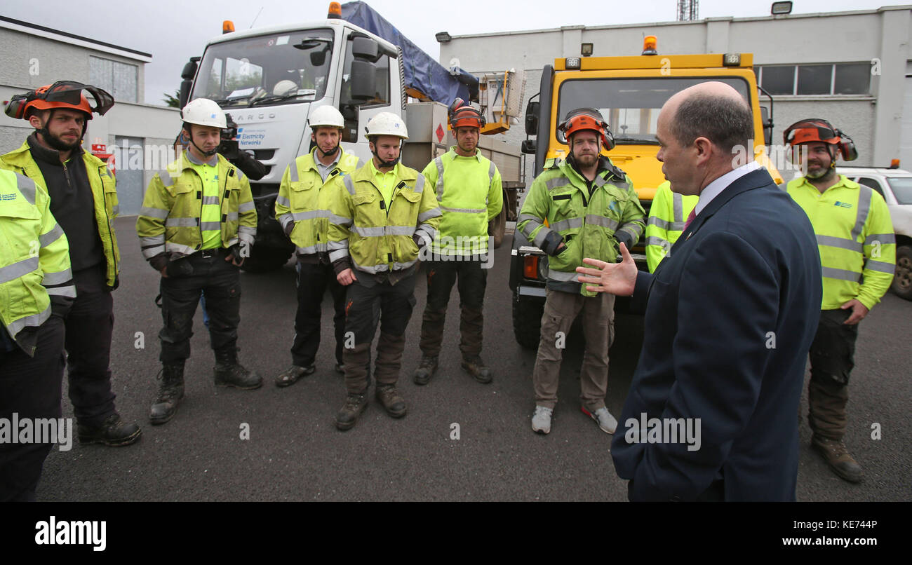 The Minister for Communications, Climate Action and Environment Denis Naughten meets with crews from Northern Ireland Electricity that have arrived to assist ESB Networks restore power to 130,000 customers still without supply at the ESB training Centre in Portlaoise . Stock Photo