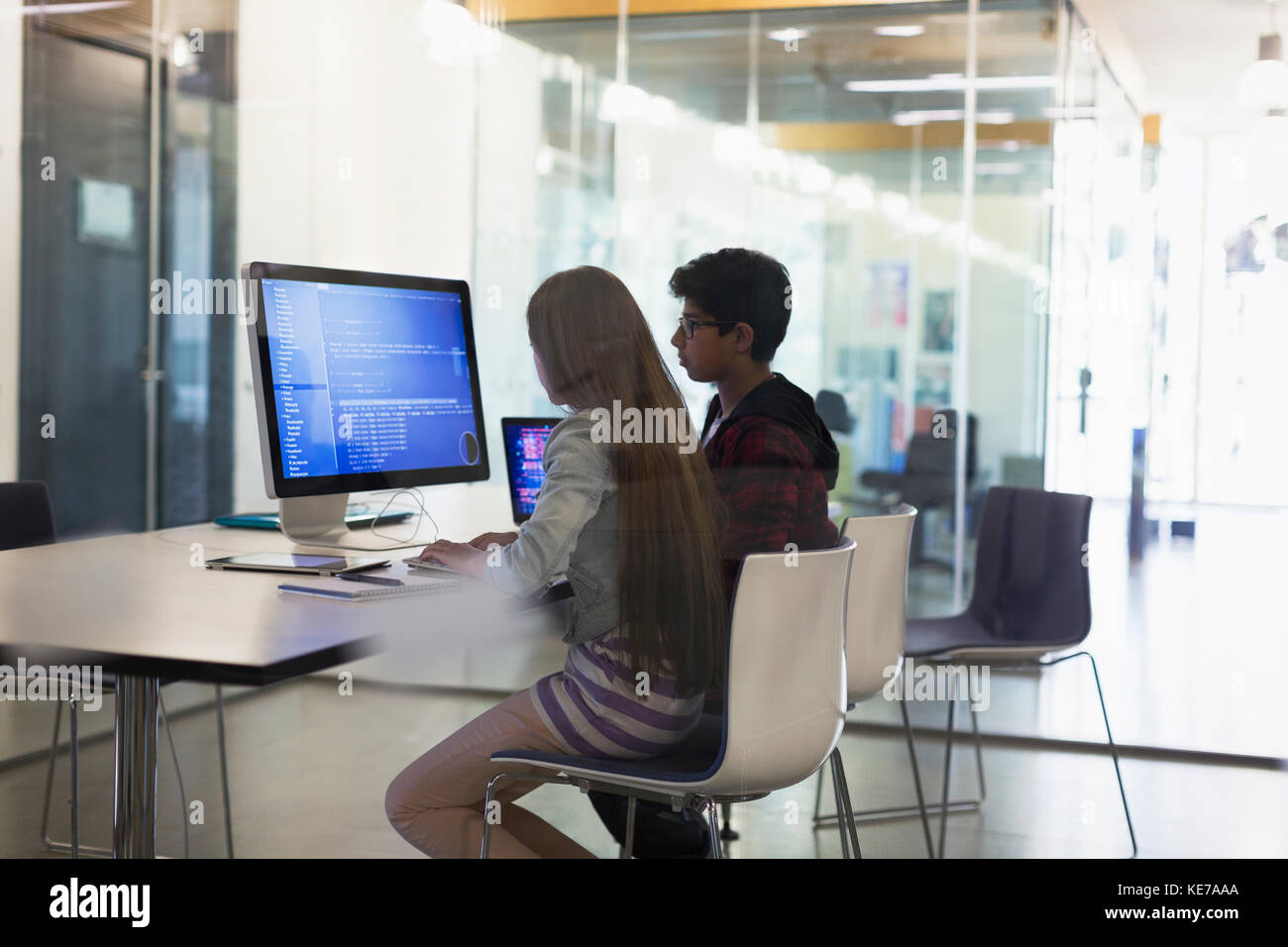 Students programming at computer in classroom Stock Photo - Alamy