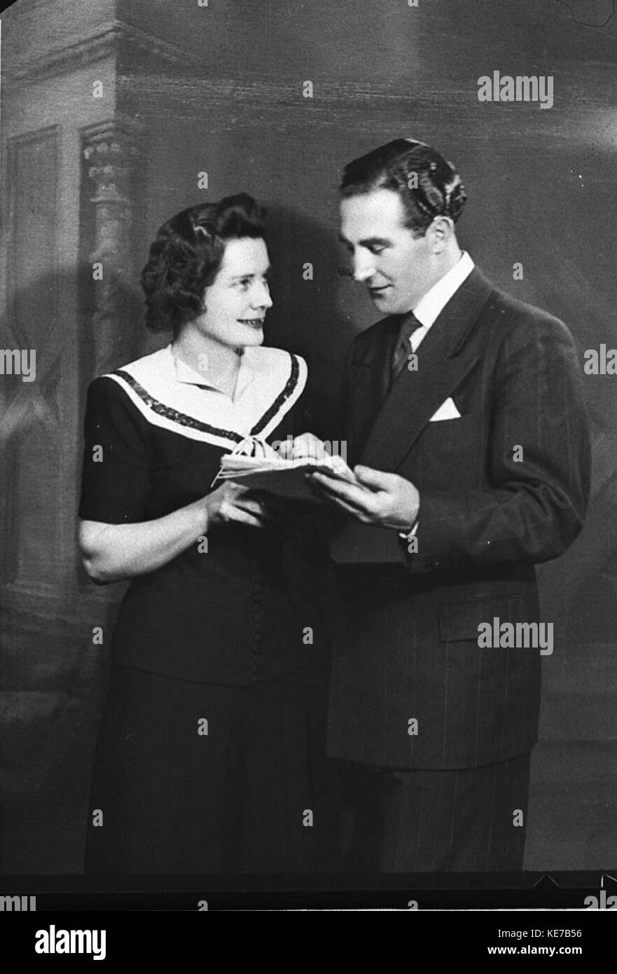 An image featuring Miss Dash and Mr. Mossfield, likely taken for a publicity campaign for the 2SM radio station, highlighting the promotional efforts of the station during a specific event or time. Stock Photo