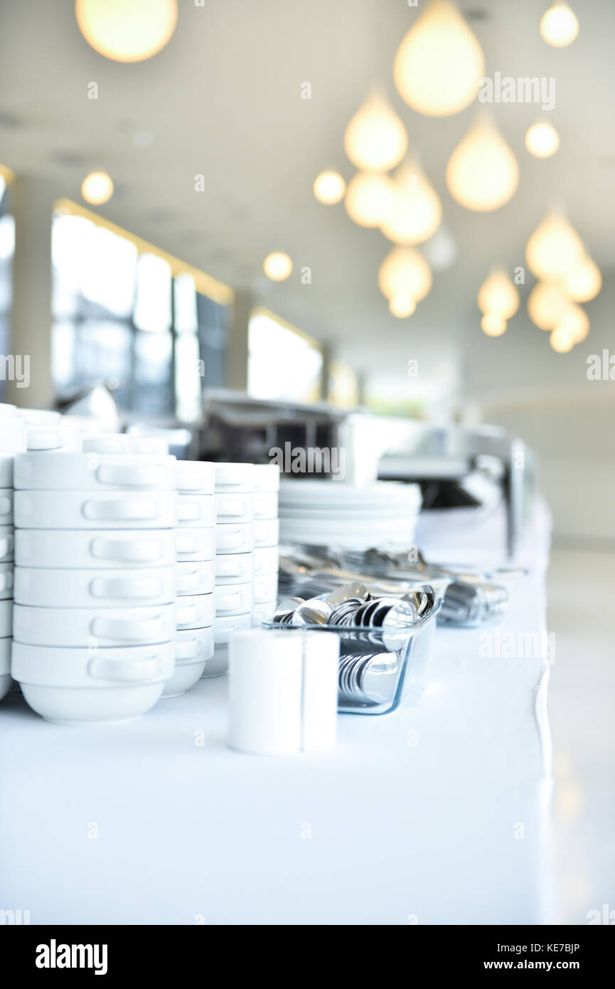 Empty catering plates, platters and trays setup before event Stock