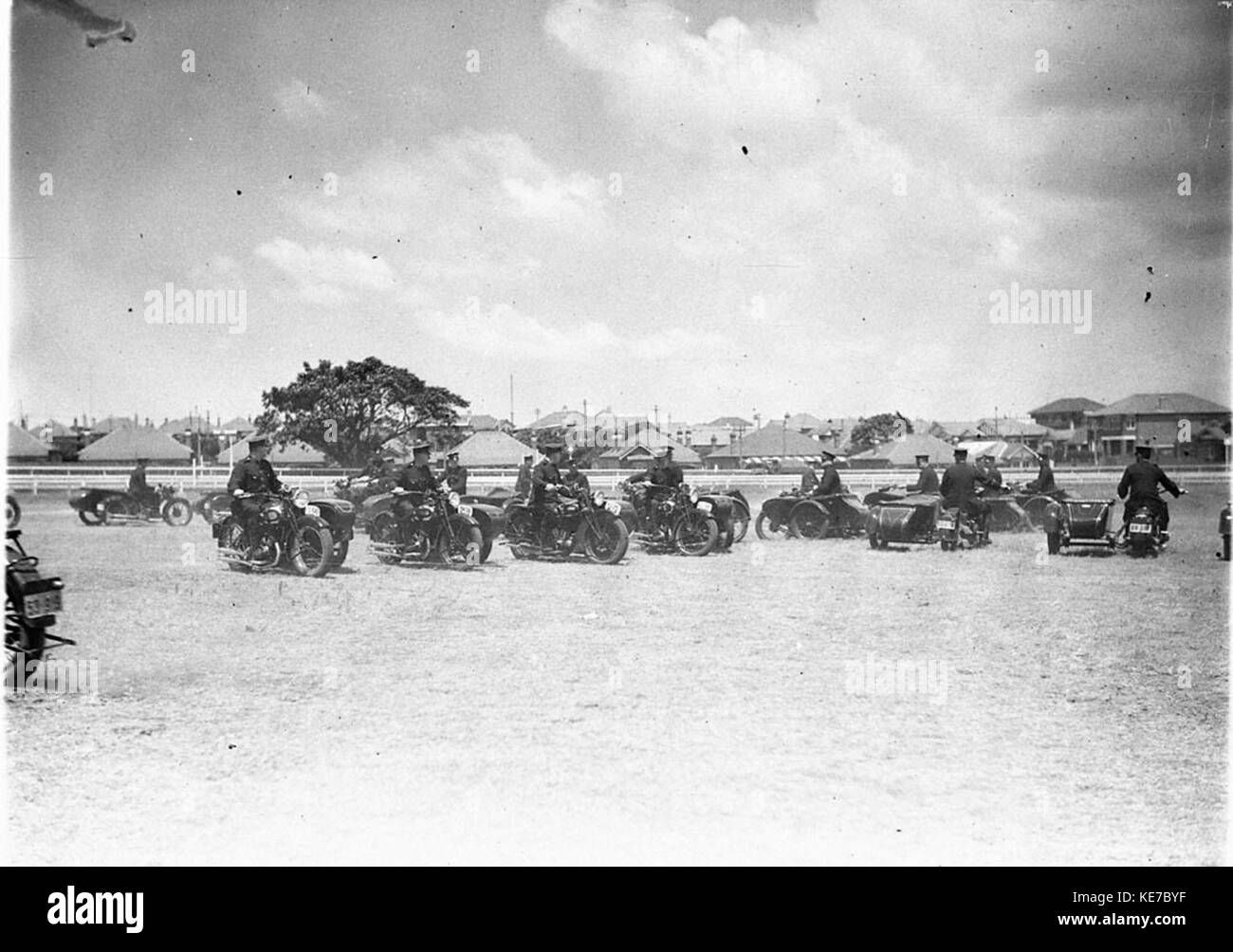 7494 Police motorcycle combination in mass formation on Kensington Racecourse Stock Photo