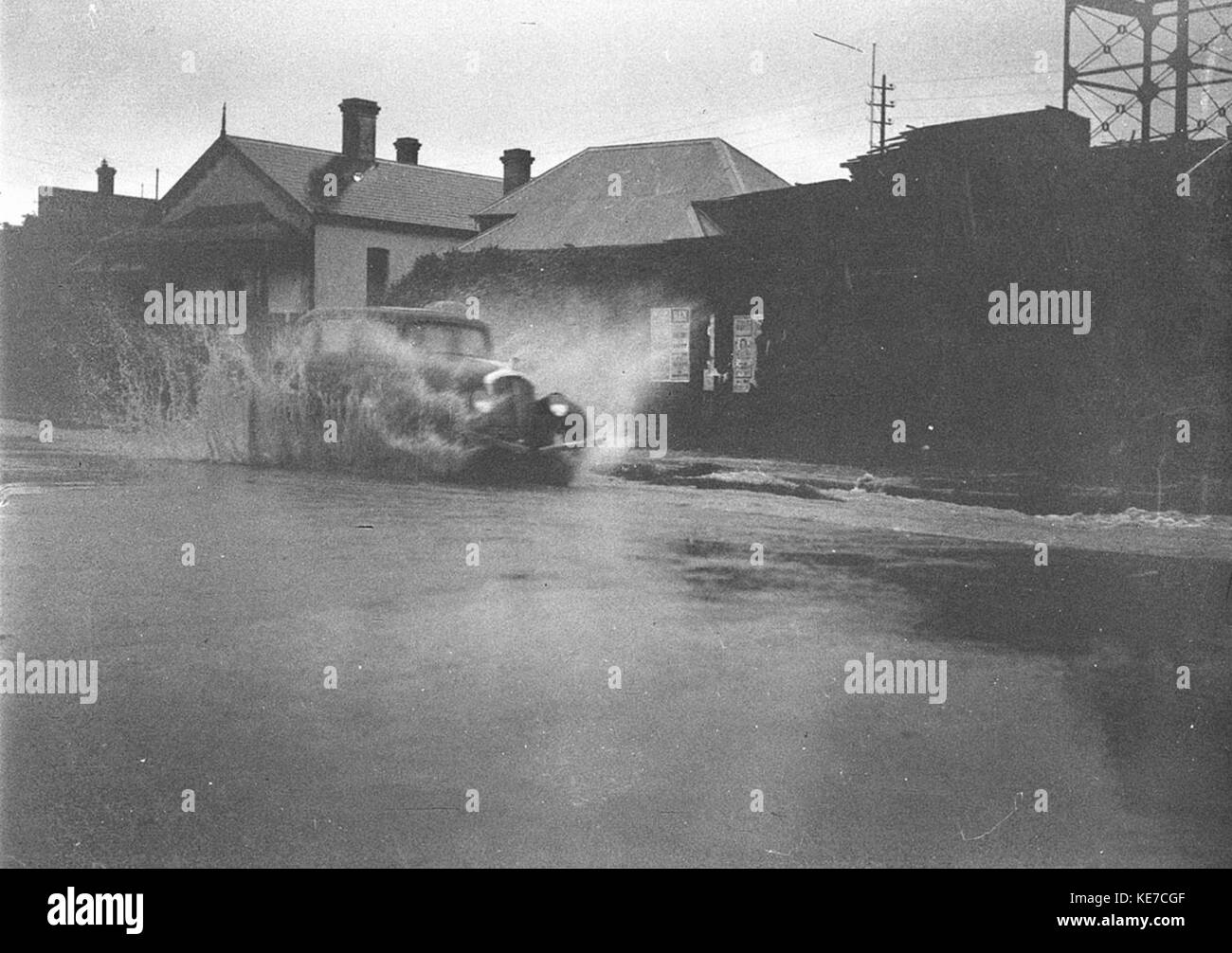 42419 Sam Hoods 1934 Willys 77 in a flooded street Stock Photo - Alamy