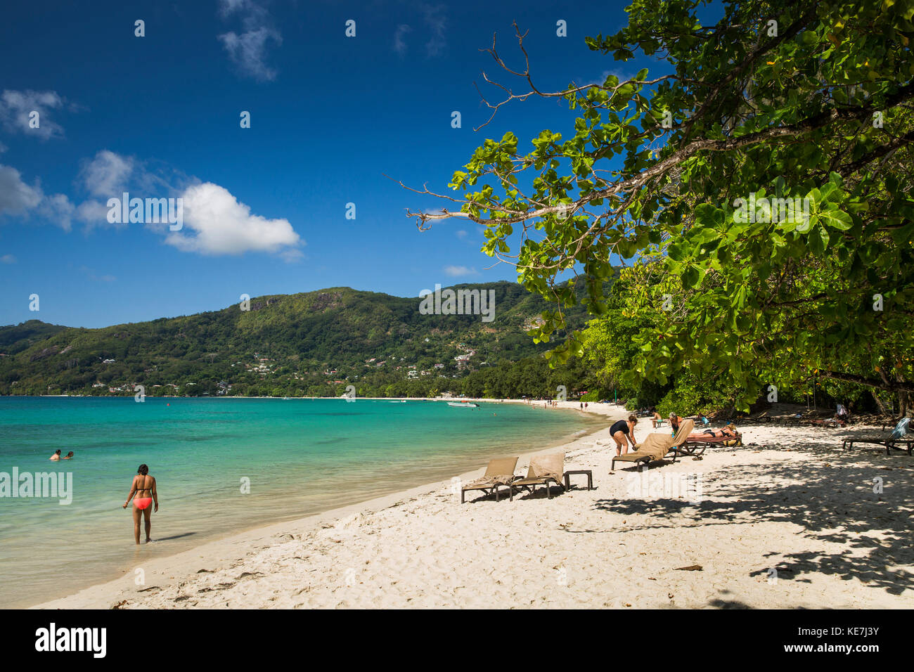 The Seychelles, Mahe, Beau Vallon, tourists on beach outside H Resort Stock Photo