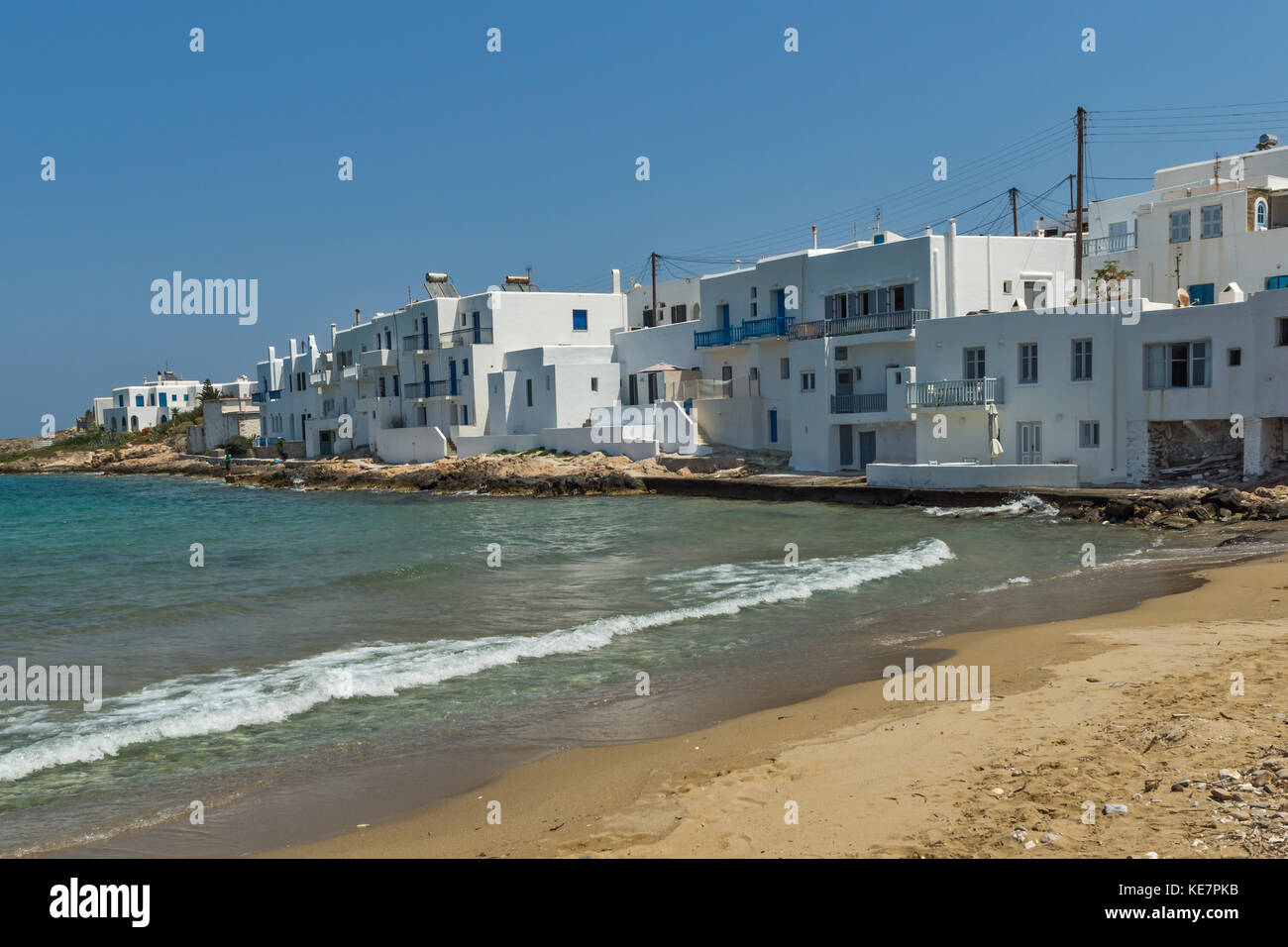 Small beach and white houses in town of Naoussa, Paros island, Cyclades