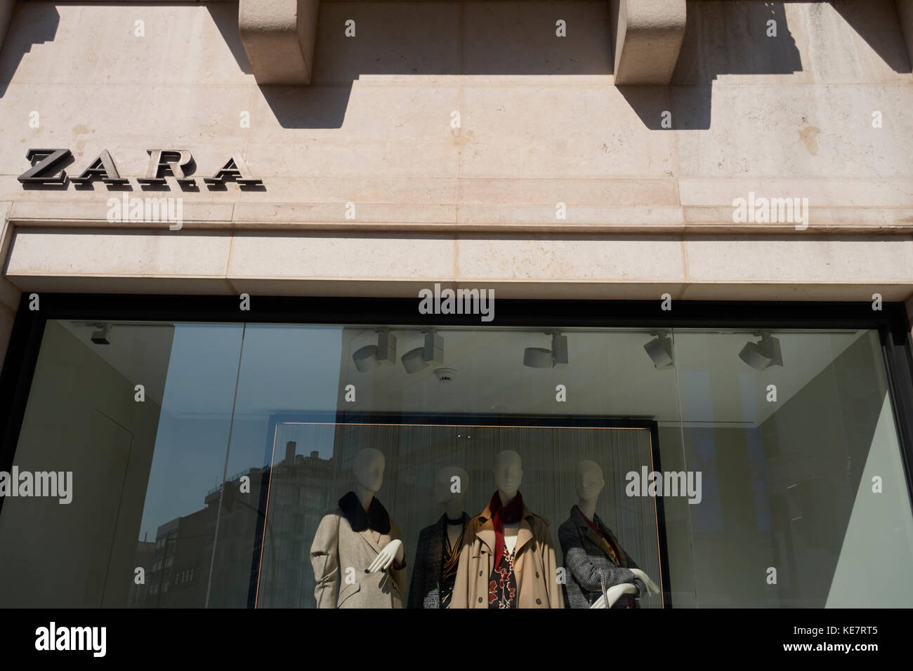 Zara store entrance, logo brand in the facade Stock Photo - Alamy