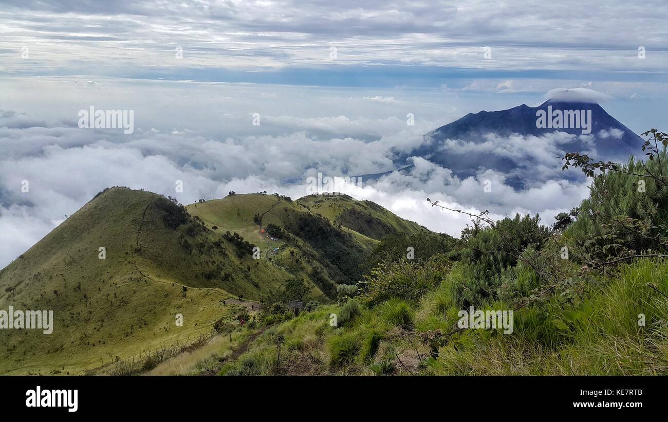Watch Merapi Mountain from Peak of Merbabu Stock Photo - Alamy
