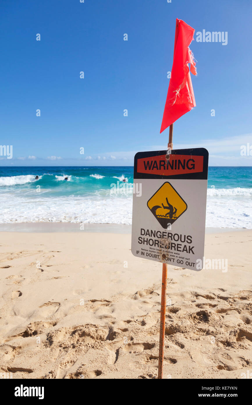 Dangerous Shorebreak sign posted at the Beach, North Shore of Oahu; Honolulu, Oahu, Hawaii, United States of America Stock Photo