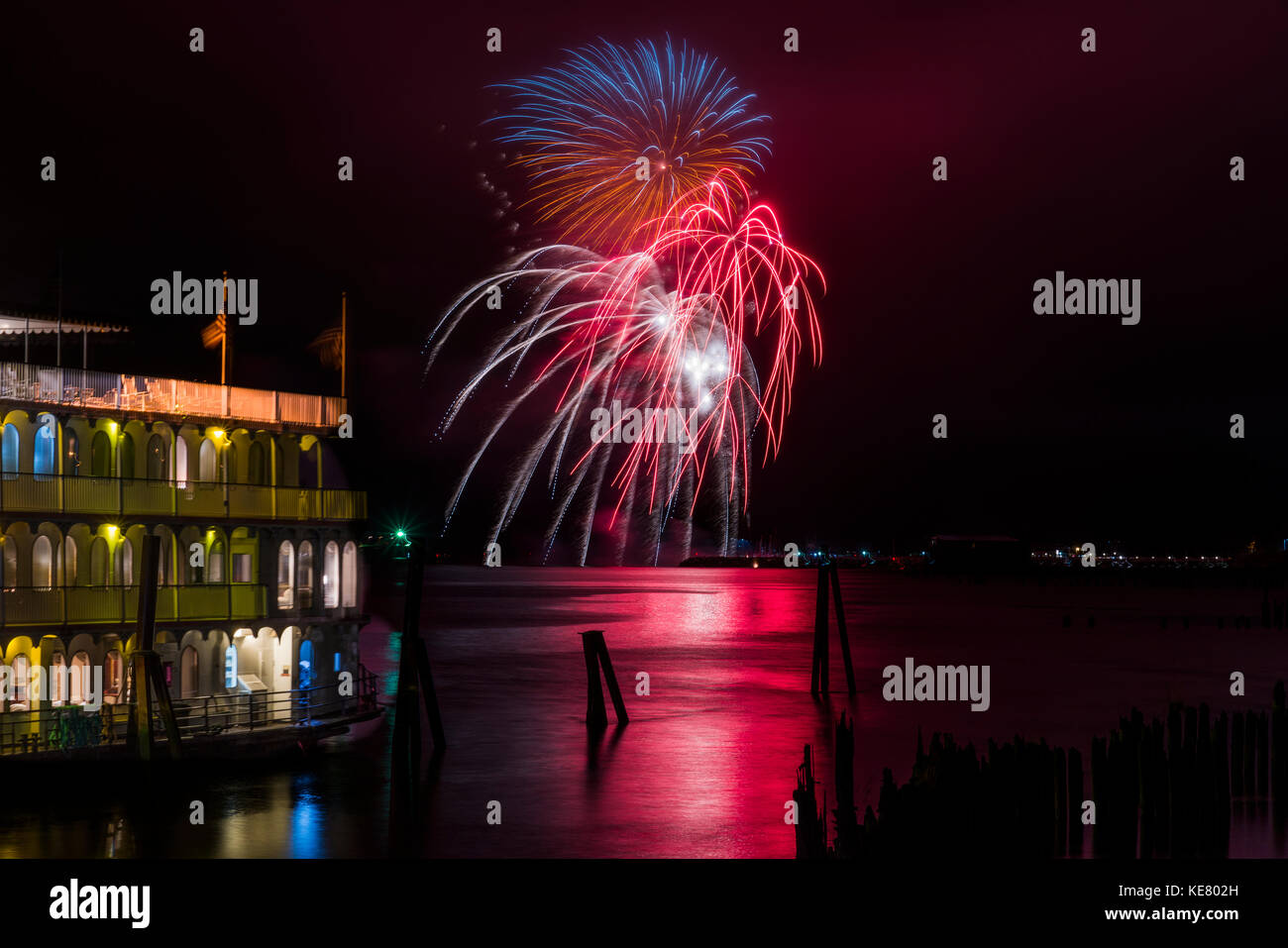 Fireworks light up the night along the Astoria riverfront; Astoria
