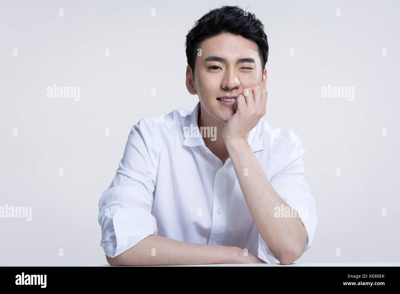 Man smiling winking hi-res stock photography and images - Alamy