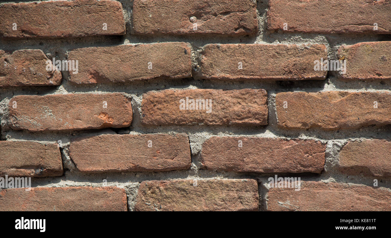 Old grunge brick wall as a background Stock Photo - Alamy