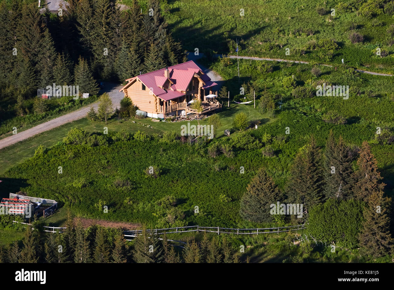 Aerial View Of A Log Cabin Home, Homer, Southcentral Alaska, USA Stock Photo