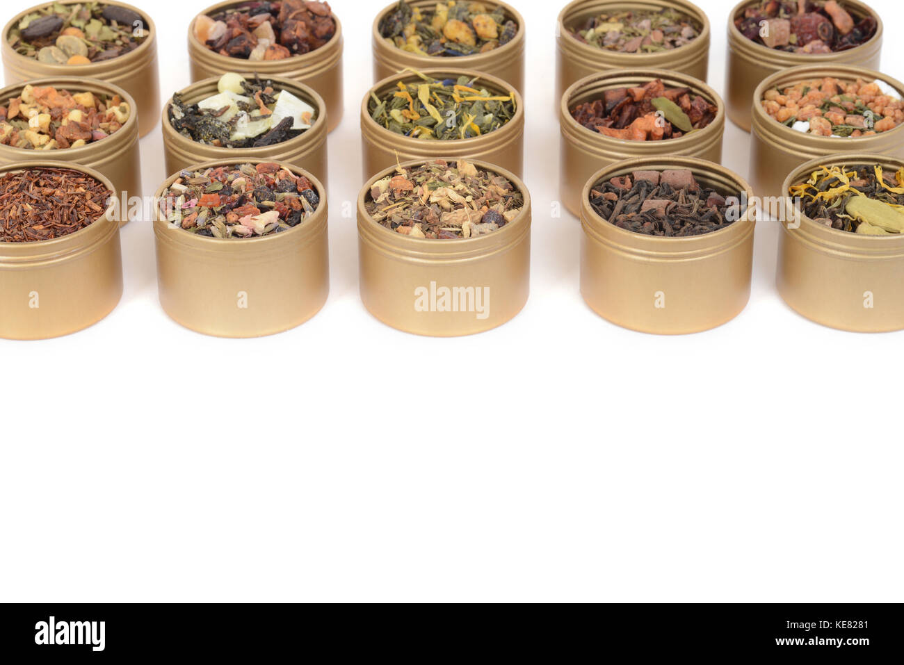 metal tins of organic tea in rows Stock Photo