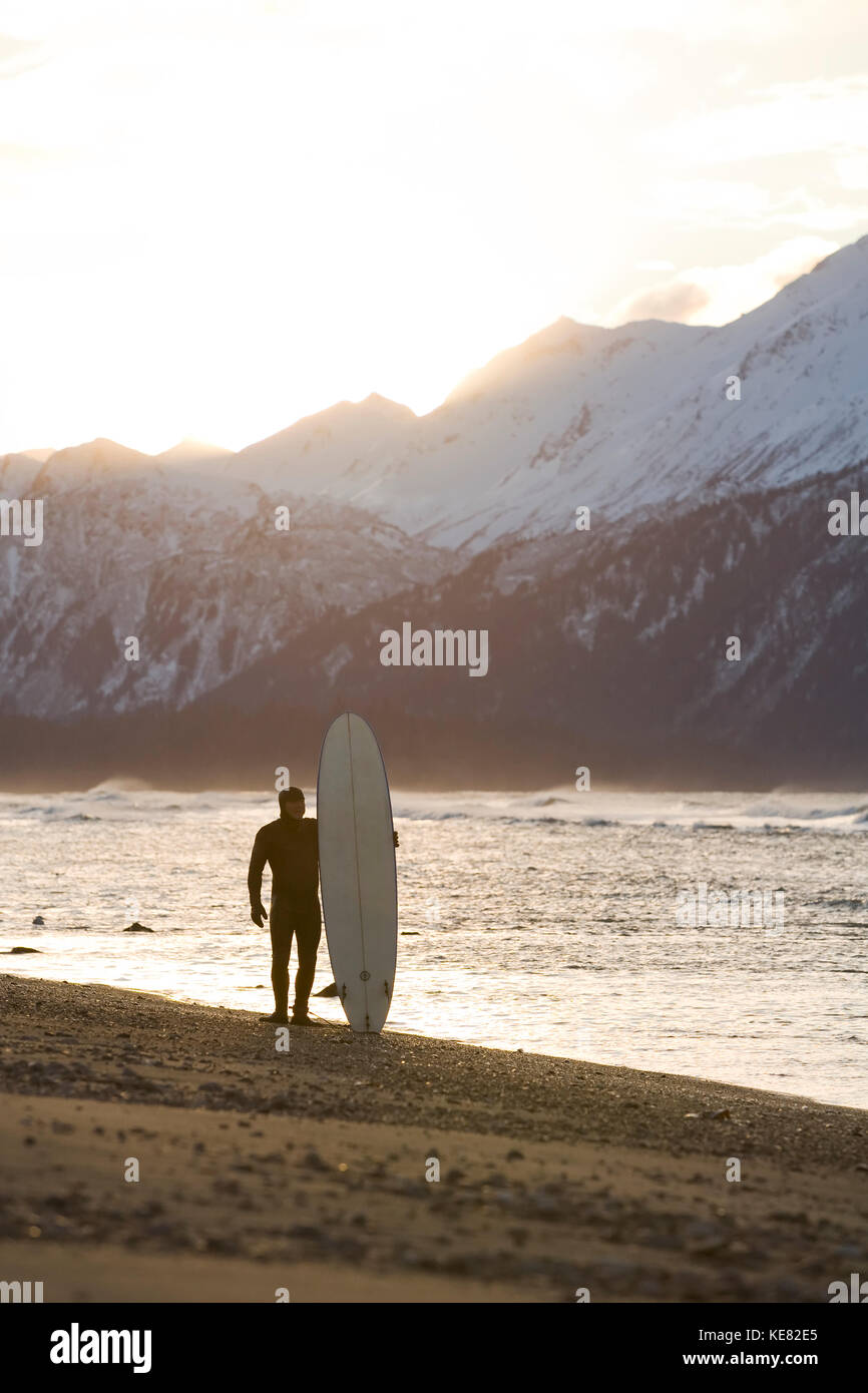 Surfer standing surfboard on beach hi-res stock photography and images ...