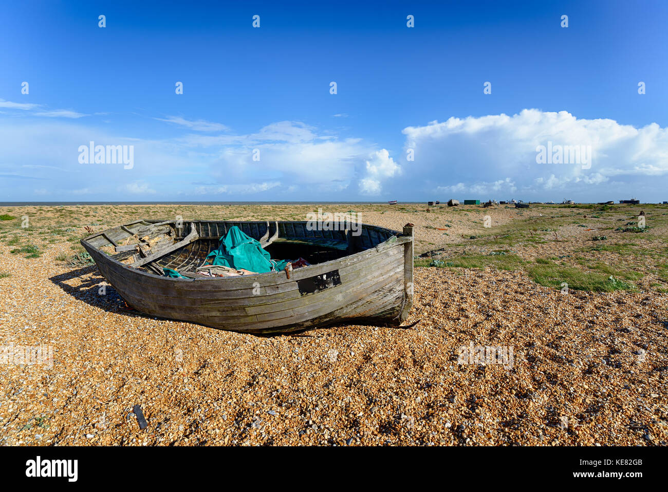 An abandoned fishing boat at Dungeness on the Kent coast Stock Photo ...