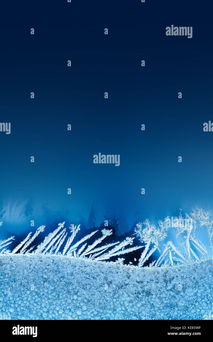 Frozen windows in winter time with frost decorations Stock Photo Alamy