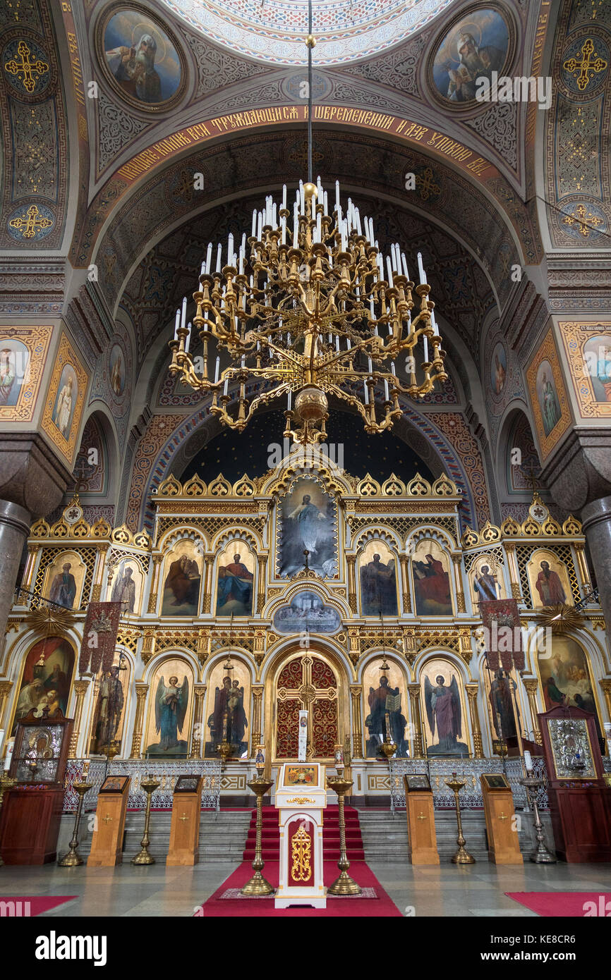 The iconostasis in Uspenski Cathedral in the city of Helsinki in Finland. The Cathedral is on a hillside on the Katajanokka peninsula overlooking Hels Stock Photo