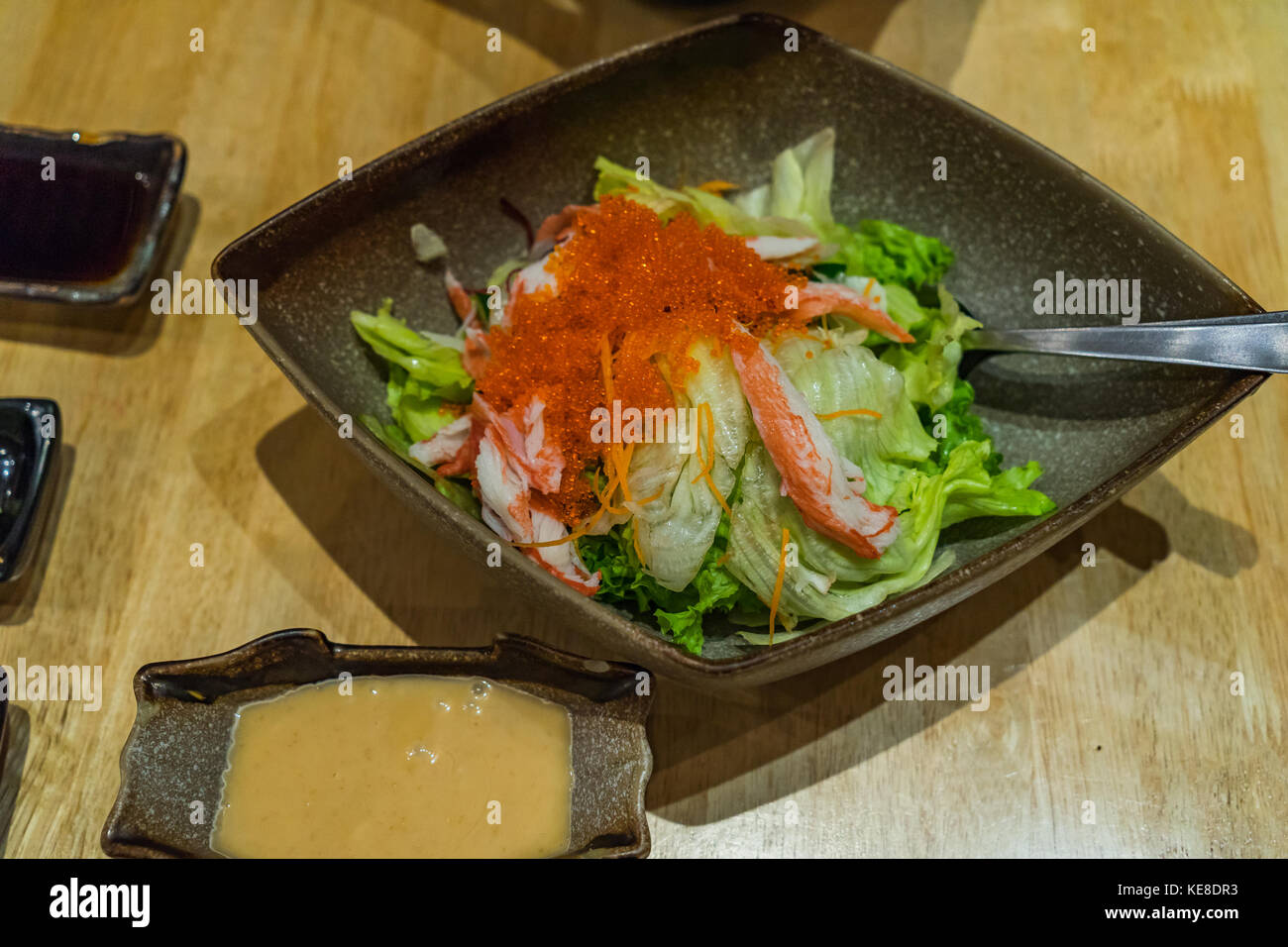 Japanese salad with carrot, iceberg lettuce,cucumber and crab stick