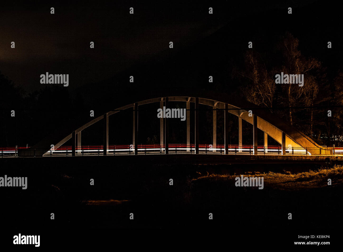 Light trails at night on bridge Stock Photo - Alamy